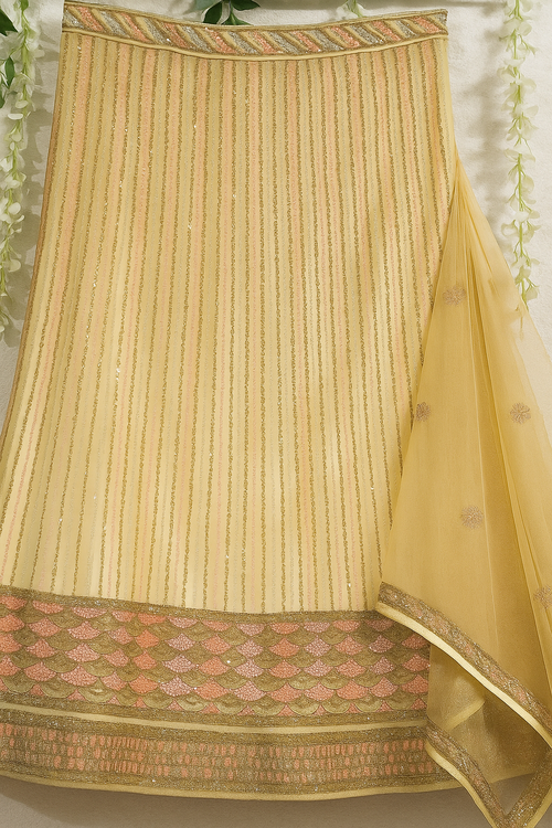 Elegant Cream-Gold Embroidered Lehenga Set with Heavy Border & Dupatta