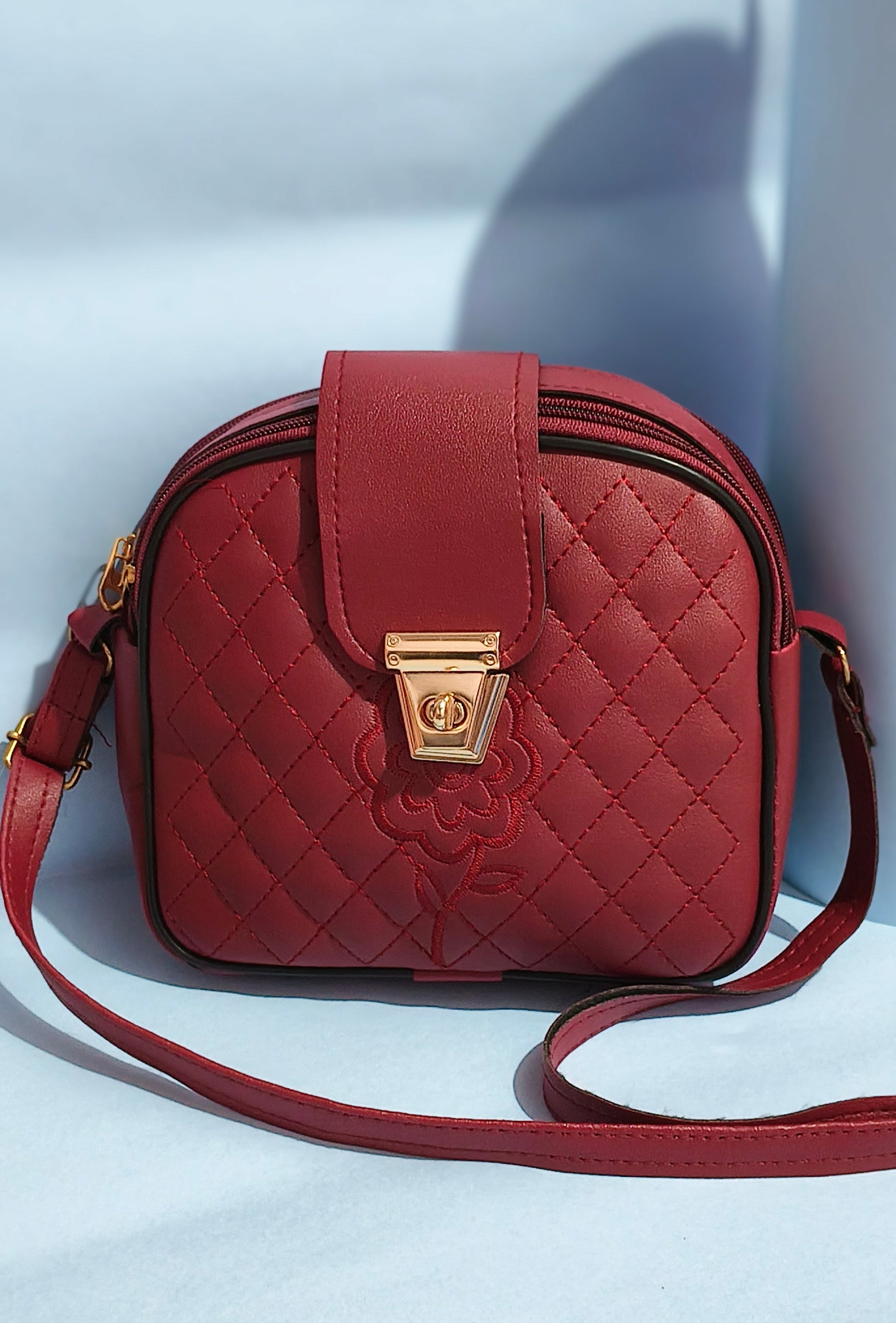 Luxury Dark Red Clutch with Golden Lock – SBS Signature Style
