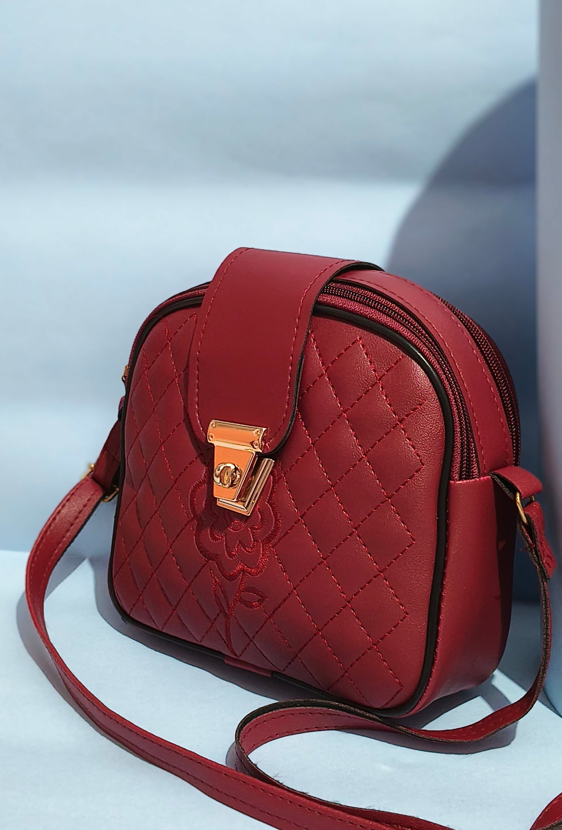 Luxury Dark Red Clutch with Golden Lock – SBS Signature Style