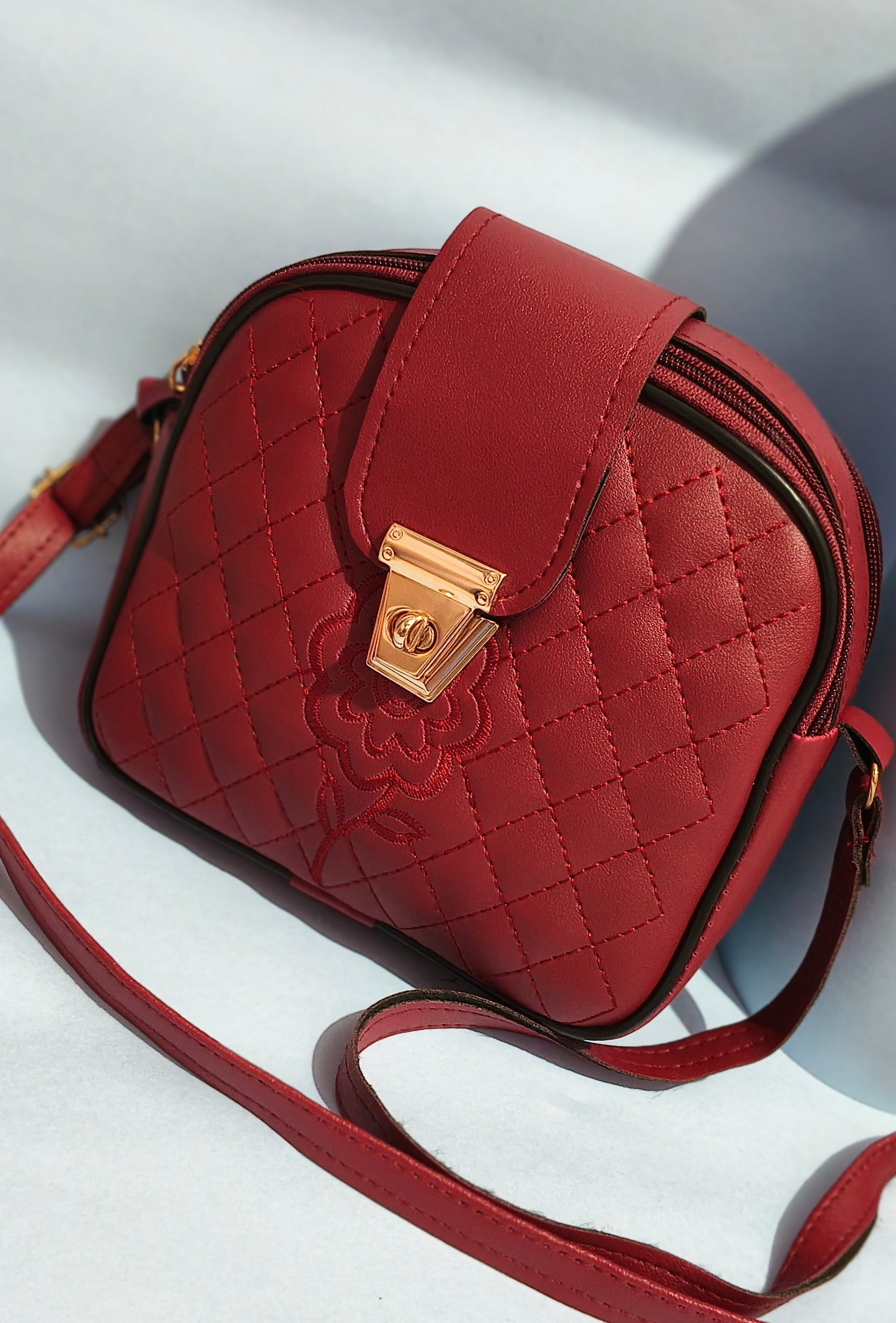 Luxury Dark Red Clutch with Golden Lock – SBS Signature Style