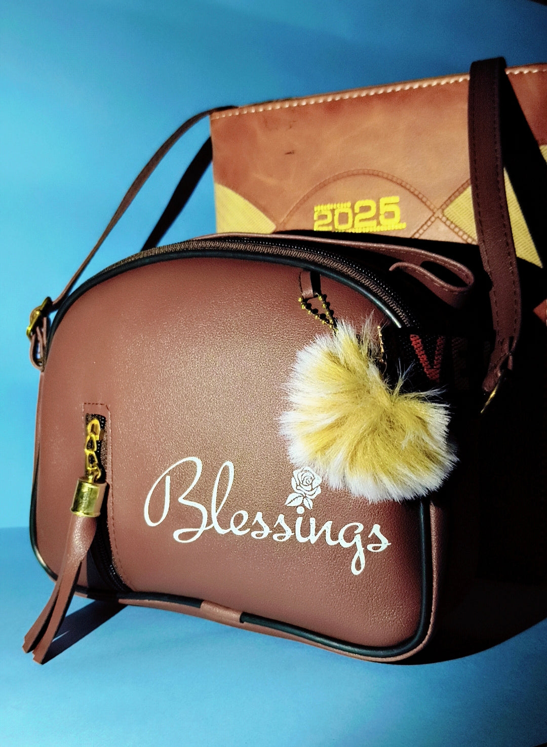 Chic Brown “Blessings” Sling Bag with Golden Zip & Fur Charm – SBS Trend Collection