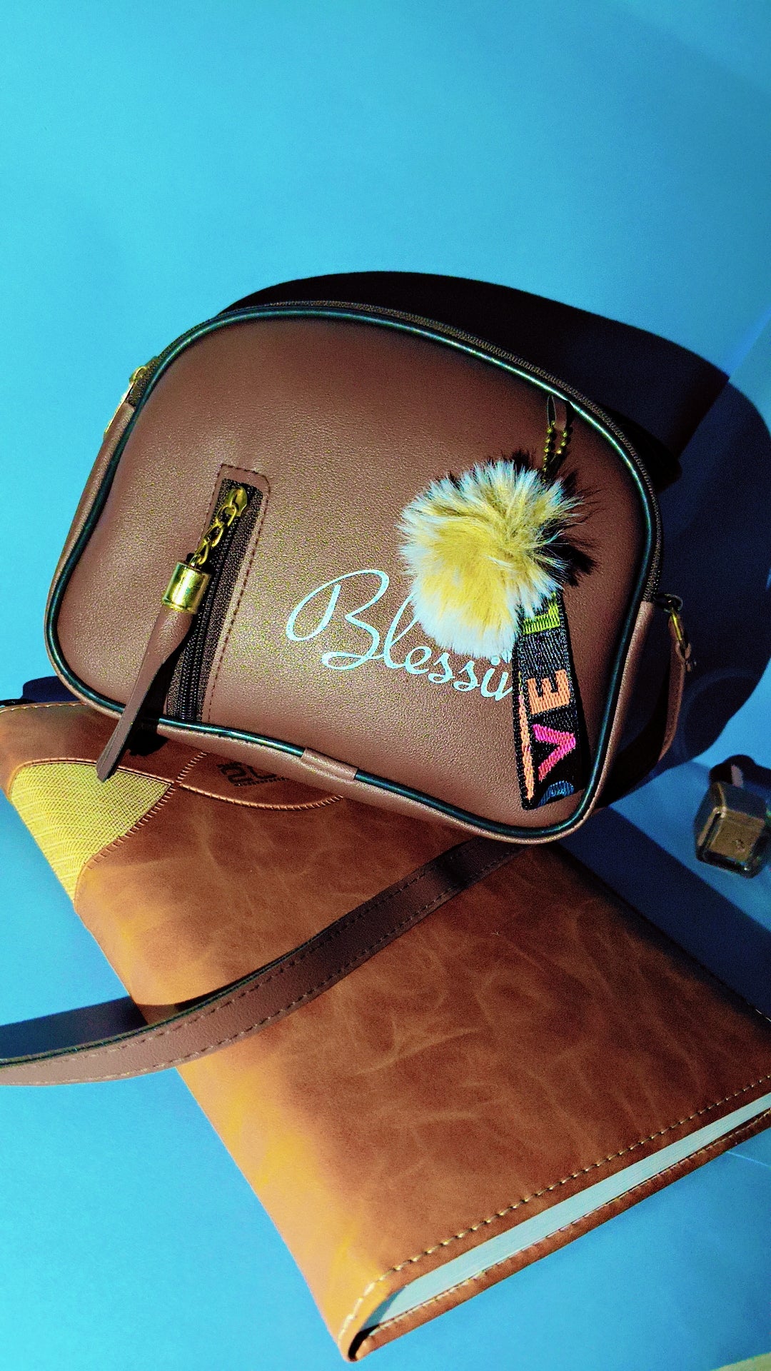 Chic Brown “Blessings” Sling Bag with Golden Zip & Fur Charm – SBS Trend Collection
