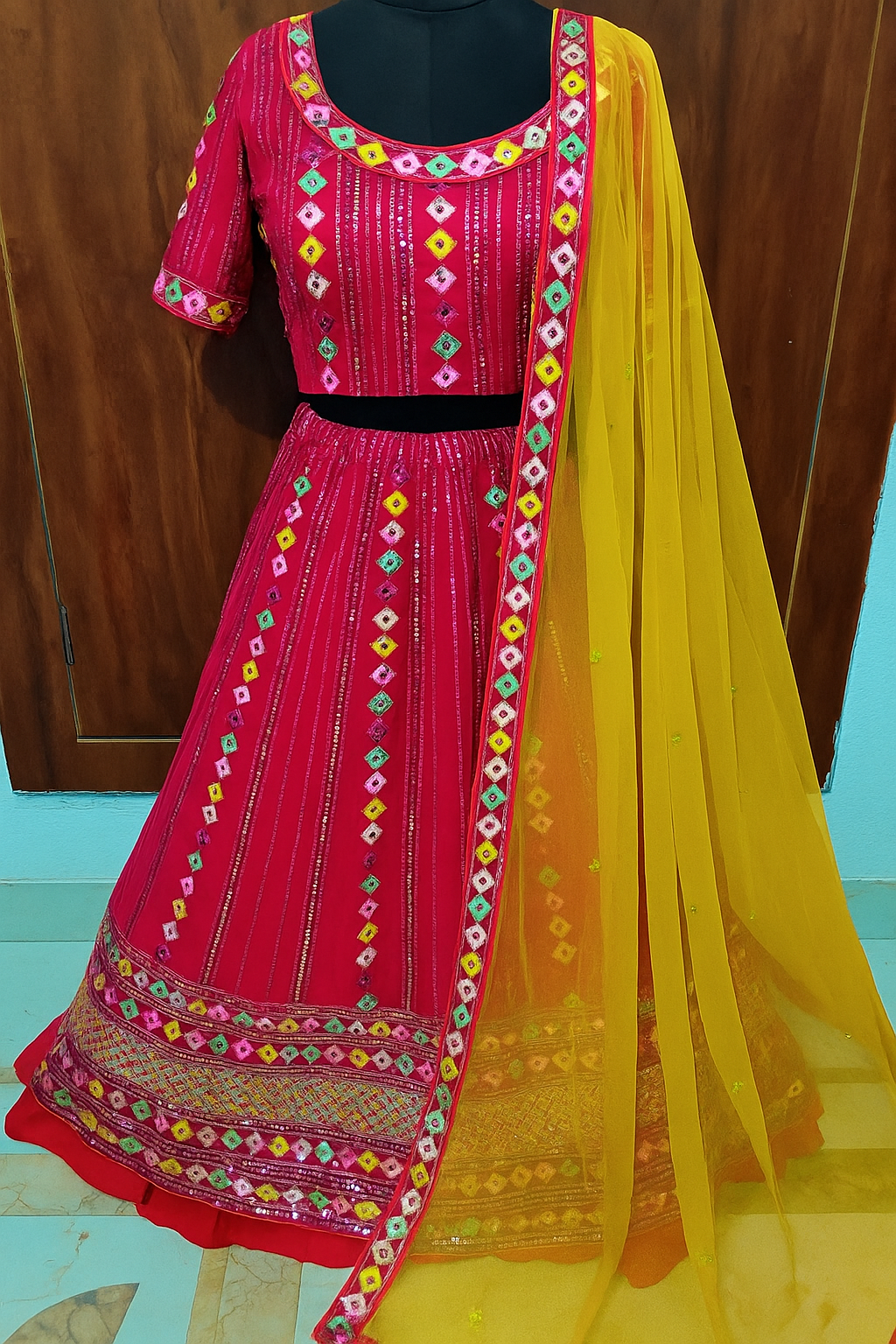 Vibrant Pink Mirror Work Lehenga with Yellow Dupatta